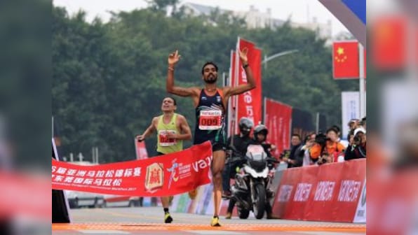 India's Gopi Thonakal, Monika Athare retain New Delhi Marathon titles