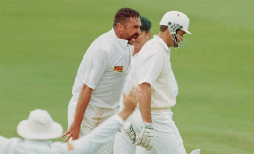 Merv Hughes (C) of Australia gives Graeme Hick of England a mouthful after dismissing him in the first Ashes Test at Old Trafford in 1993. Getty Images
