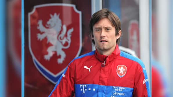 Former Arsenal midfielder Tomas Rosicky announces retirement from professional football