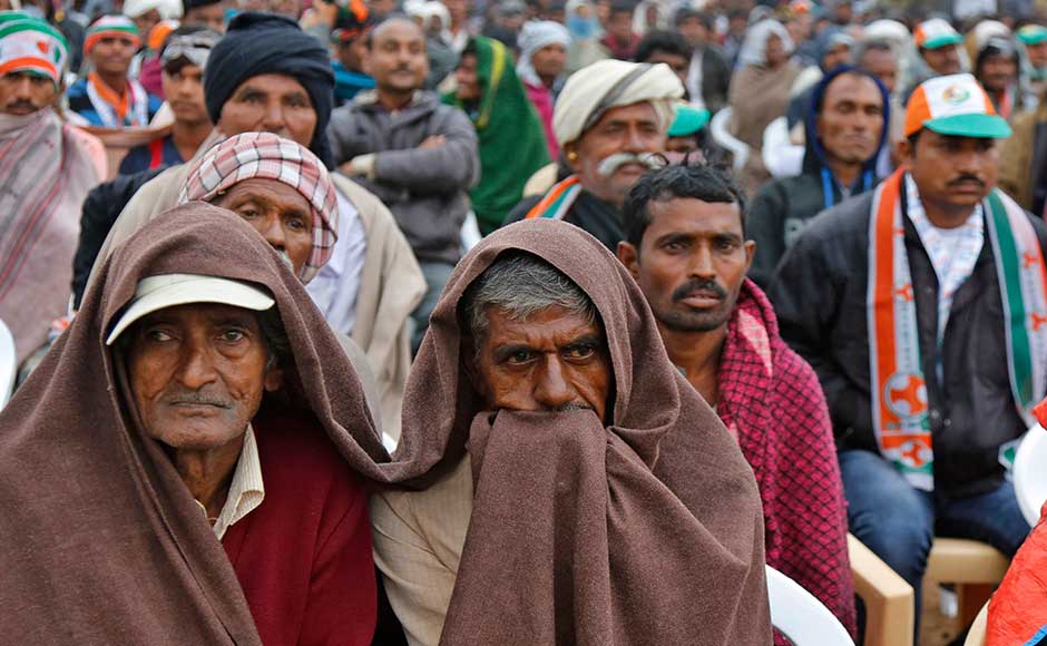 Authorities have sounded an alert over the cyclone, which is expected to hit the Gujarat coast around Tuesday midnight. Congress supporters cover themselves to protect from cold and rain during a rally at Dhrangadhra in Surendranagar district. AP Authorities have sounded an alert over the cyclone, which is expected to hit the Gujarat coast around Tuesday midnight. Congress supporters cover themselves to protect from cold and rain during a rally at Dhrangadhra in Surendranagar district. AP