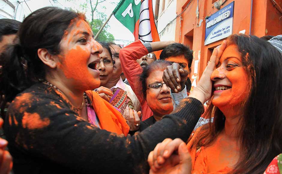 The twin victories tightened BJP's grip over the country's politics that saw Congress lose one more state, and with general elections only 18 months away. BJP workers mark the Assembly victories at party headquarters in Kolkata. PTI The twin victories tightened BJP's grip over the country's politics that saw Congress lose one more state, and with general elections only 18 months away. BJP workers mark the Assembly victories at party headquarters in Kolkata. PTI