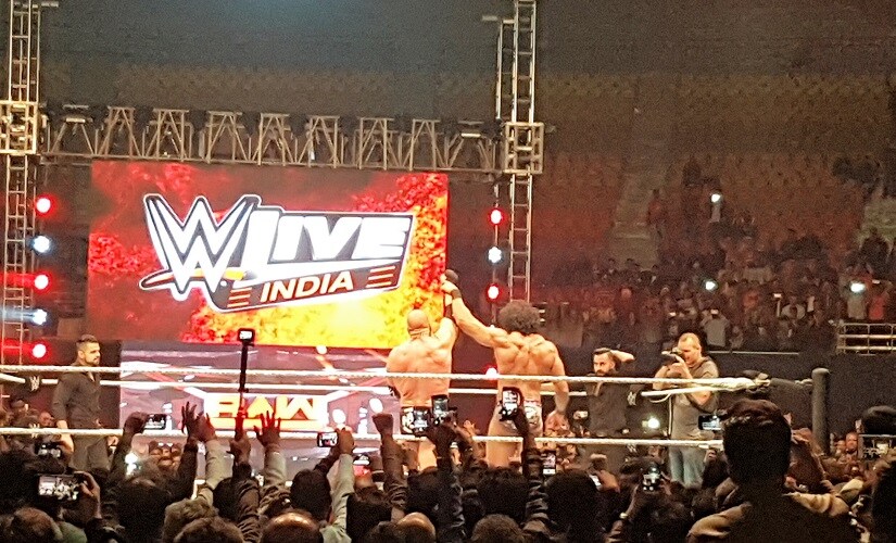 Triple H and Jinder Mahal.
