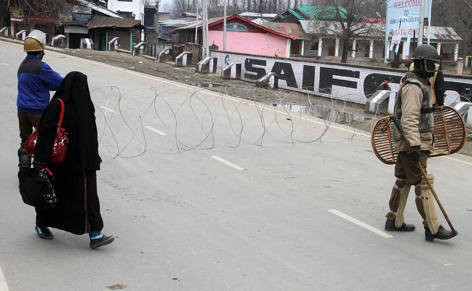 There was a heavy deployment of security forces on entry points. Barricades were erected on roads to curb the movement of people in the area. Firstpost/Sameer Mushtaq There was a heavy deployment of security forces on entry points. Barricades were erected on roads to curb the movement of people in the area. Firstpost/Sameer Mushtaq
