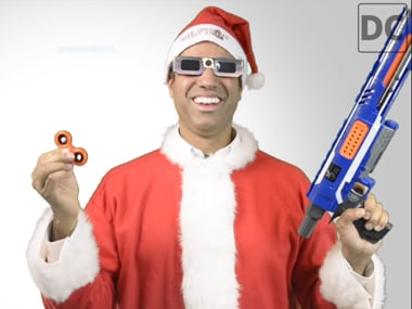 Ajit Pai prances around in a Santa suit as he explains his take on net neutrality. Image: The Daily Caller