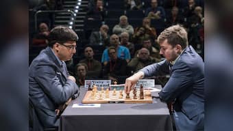 London Chess Classic: Viswanathan Anand draws with Sergey Karjakin to flounder at the bottom; Magnus Carlsen escapes loss