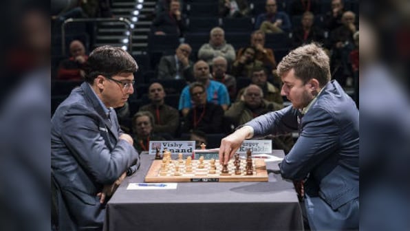 London Chess Classic: Viswanathan Anand draws with Sergey Karjakin to flounder at the bottom; Magnus Carlsen escapes loss