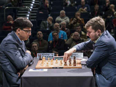 London Chess Classic: Viswanathan Anand draws with Sergey Karjakin to flounder at the bottom; Magnus Carlsen escapes loss London Chess Classic: Viswanathan Anand draws with Sergey Karjakin to flounder at the bottom; Magnus Carlsen escapes loss