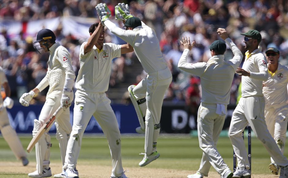 Australia's Mitchell Starc, second left, celebrates with teammates after taking the wicket of England's Craig Overton, left, during the fifth day of their Ashes Test match in Adelaide.<br />AP Australia's Mitchell Starc, second left, celebrates with teammates after taking the wicket of England's Craig Overton, left, during the fifth day of their Ashes Test match in Adelaide.<br />AP
