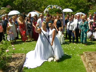 Two female couples tie knot in Australia's first same-sex wedding under new legislation Two female couples tie knot in Australia's first same-sex wedding under new legislation