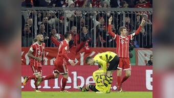 German Cup: Thomas Mueller helps Bayern Munich beat Borussia Dortmund; Werder Bremen enter quarters