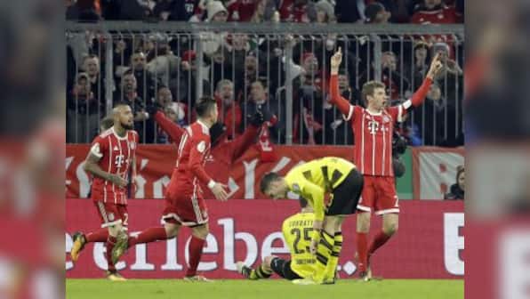 German Cup: Thomas Mueller helps Bayern Munich beat Borussia Dortmund; Werder Bremen enter quarters