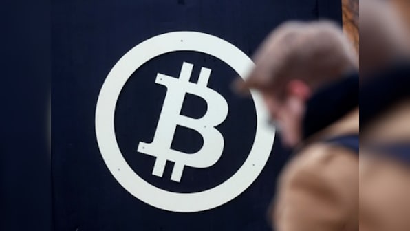 Bitcoin dips below $11,000 after recording a high of $11,800 on 3 December