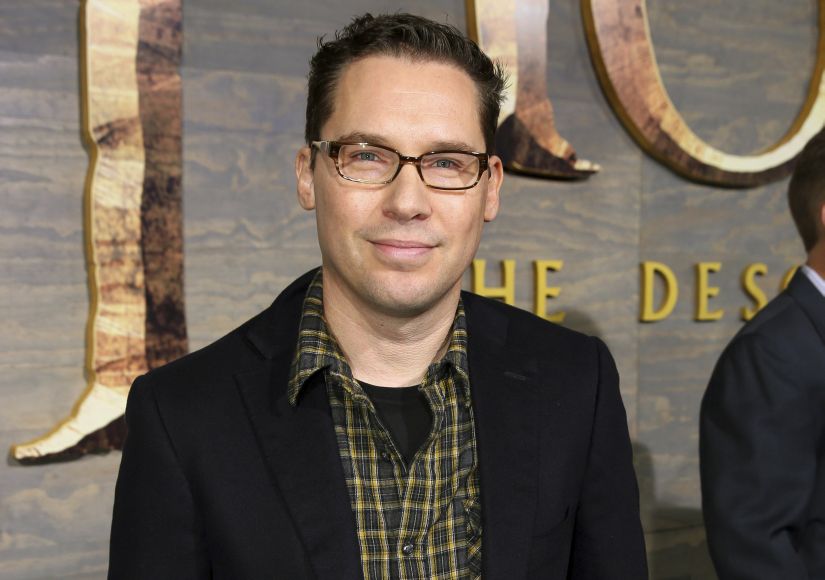 FILE - This Dec. 2, 2013 file photo shows Bryan Singer at the Los Angeles premiere of "The Hobbit: The Desolation of Smaug" at the Dolby Theatre. Singer has left the Queen biopic "Bohemian Rhapsody" in the middle of production. A representative for Twentieth Century Fox Film Corp. said Monday, Dec. 4, 2017, that Singer is no longer the director of the film. (Photo by Matt Sayles/Invision/AP, File)