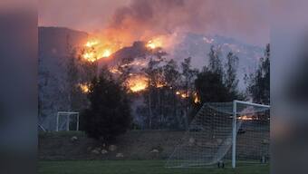 Six wildfires continue to flare in southern California; thousands evacuated as fire crews struggle to contain flames