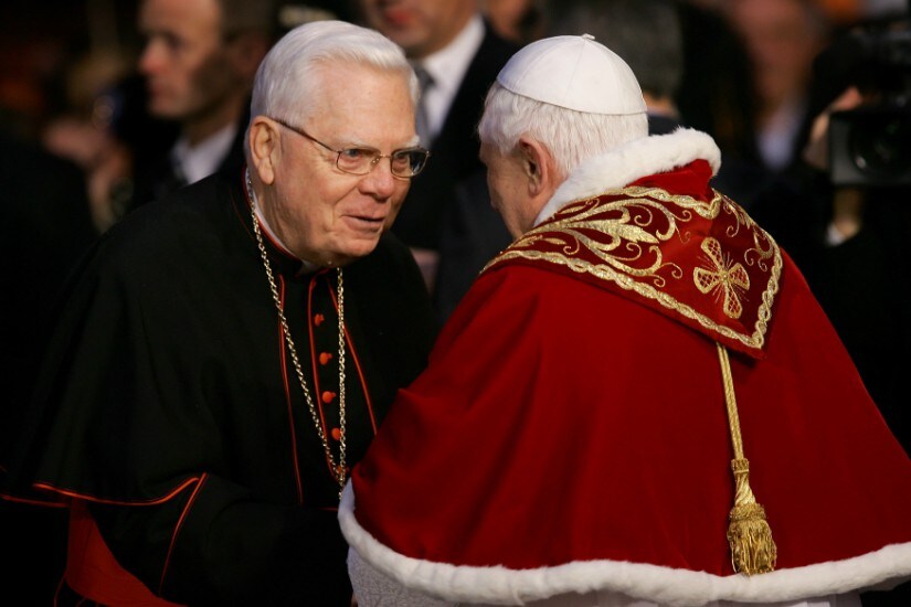Pope Benedict XVI (R) greets Cardinal Bernard Law after presiding a celebration over the feast of the Immaculate Conception in Rome’s Spanish Steps in 2005. Reuters