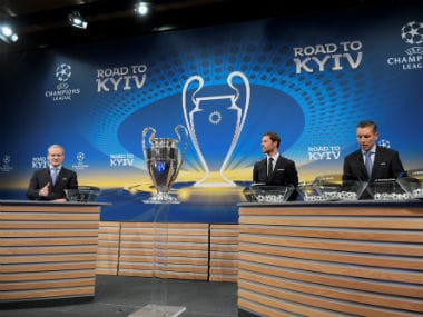 EFA director of competitions Giorgio Marchetti, Spanish former international Xabi Alonso and UEFA head of club competitions Michael Heselschwerdt take part in the draw for the round of 16 of the UEFA Champions League football tournament at the UEFA headquarters in Nyon. AFP