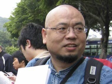 File image of Wu Gan. also known as the Vulgar Butcher, outside a court house in China. AP