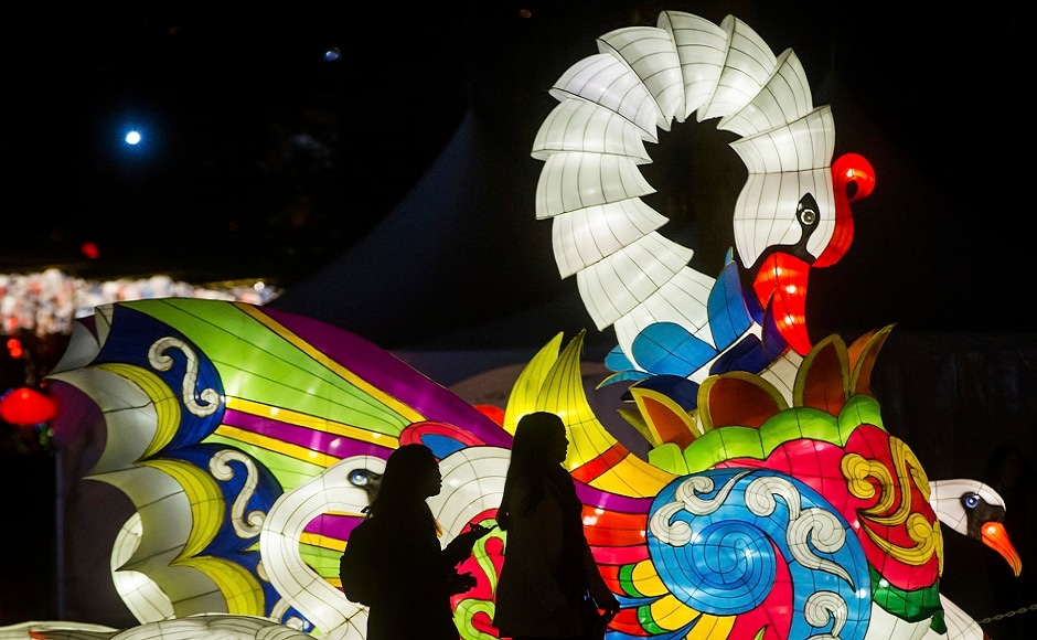 Two young women walk past a swan lantern during the opening night of the Vancouver Chinese Lantern Festival at the Pacific National Exhibition, in Vancouver, British Columbia. The festival features hundreds of illuminated lanterns. AP Two young women walk past a swan lantern during the opening night of the Vancouver Chinese Lantern Festival at the Pacific National Exhibition, in Vancouver, British Columbia. The festival features hundreds of illuminated lanterns. AP