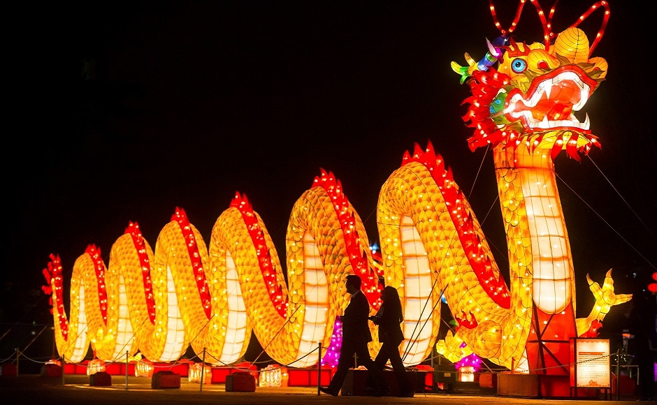 People walk past a dragon during the opening night of the Vancouver Chinese Lantern Festival at the Pacific National Exhibition, in Vancouver, British Columbia. AP People walk past a dragon during the opening night of the Vancouver Chinese Lantern Festival at the Pacific National Exhibition, in Vancouver, British Columbia. AP