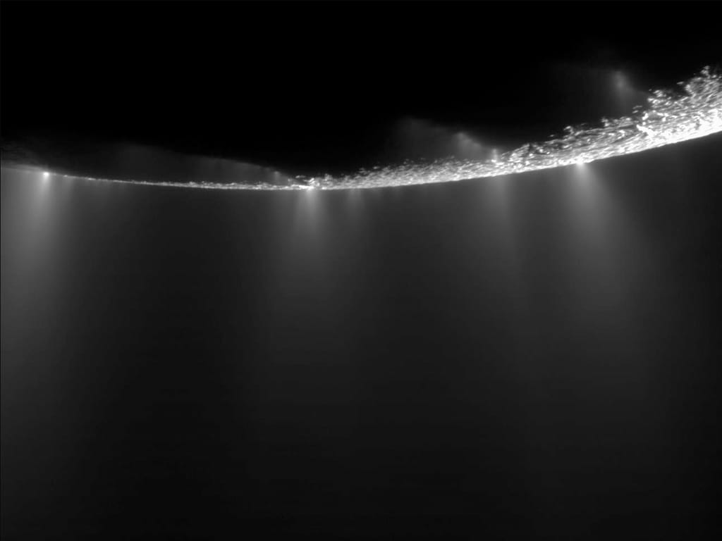 Water gushes out in spouts from a global subsurface ocean on Enceladus. Image: NASA