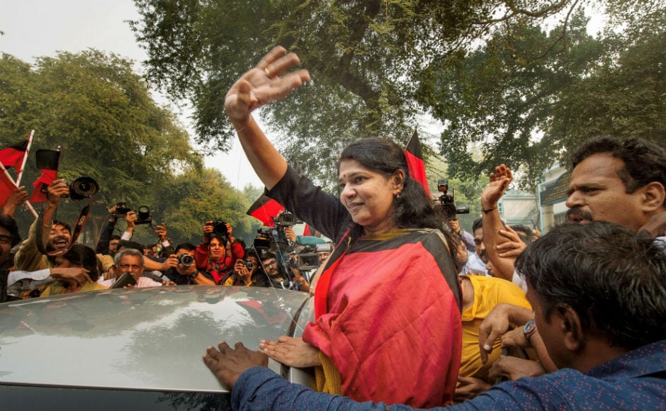 DMK supporters were seen bursting fire crackers outside the court complex and showered Raja and Kanimozhi with flowers as soon as they stepped out of court. PTI DMK supporters were seen bursting fire crackers outside the court complex and showered Raja and Kanimozhi with flowers as soon as they stepped out of court. PTI