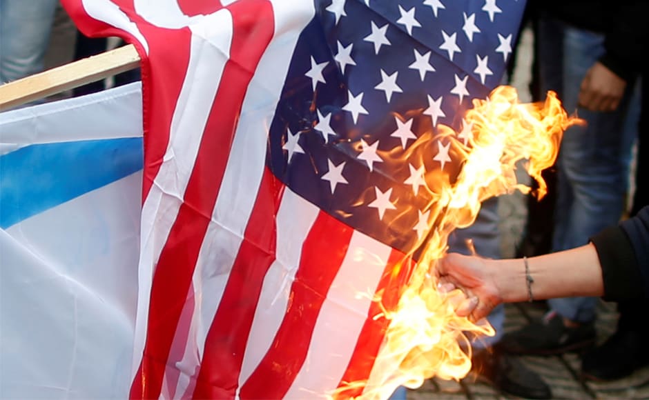 Palestinian demonstrators burnt a US flag during a protest in Gaza City. Jerusalem's eastern sector was captured by Israel in a 1967 war and annexed in a move not recognised internationally. Palestinians claim East Jerusalem for the capital of an independent state they seek. Reuters Palestinian demonstrators burnt a US flag during a protest in Gaza City. Jerusalem's eastern sector was captured by Israel in a 1967 war and annexed in a move not recognised internationally. Palestinians claim East Jerusalem for the capital of an independent state they seek. Reuters