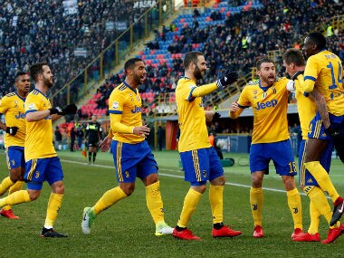 uventus’ Mario Mandzukic celebrates with team mates after scoring their second goal. Reuters
