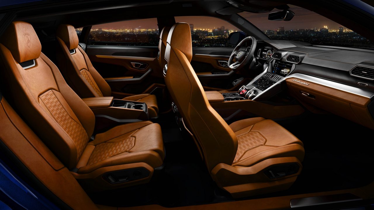 The proprietory Lamborghini hexagonal theme is seen throughout interior elements such as air vents, door handles and even in items such as the cup holders and airbag modules. Image: Lamborghini The proprietory Lamborghini hexagonal theme is seen throughout interior elements such as air vents, door handles and even in items such as the cup holders and airbag modules. Image: Lamborghini
