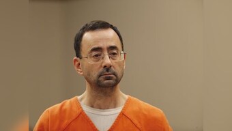 Larry Nassar, ex-USA Gymnastics doctor accused of sexually assaulting over 100 girls, jailed for 60 years for child porn