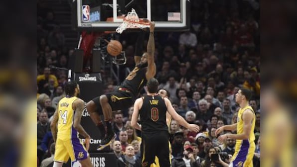 NBA: LeBron James' triple-double helps Cavaliers defeat Lakers; Warriors notch eighth straight win