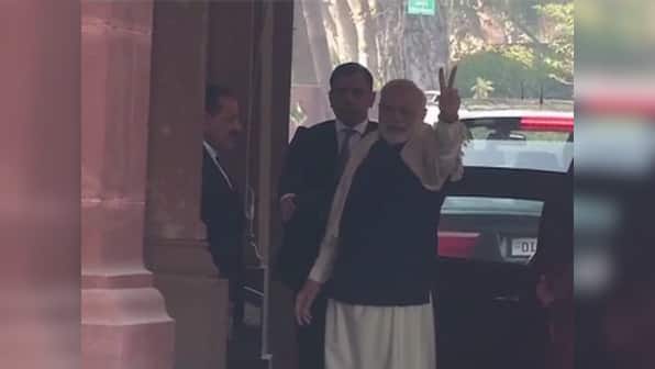 Narendra Modi flashes victory sign before entering Parliament as BJP surges ahead in Gujarat, Himachal Pradesh