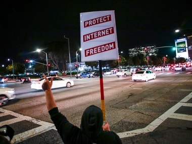 Supporter of Net Neutrality Lance Brown Eyes protests the FCC's recent decision to repeal the program. Image: Reuters