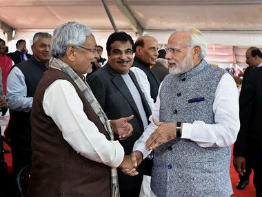Nitish Kumar visits Gujarat after 14 years to attend Vijay Rupani's swearing-in ceremony Nitish Kumar visits Gujarat after 14 years to attend Vijay Rupani's swearing-in ceremony