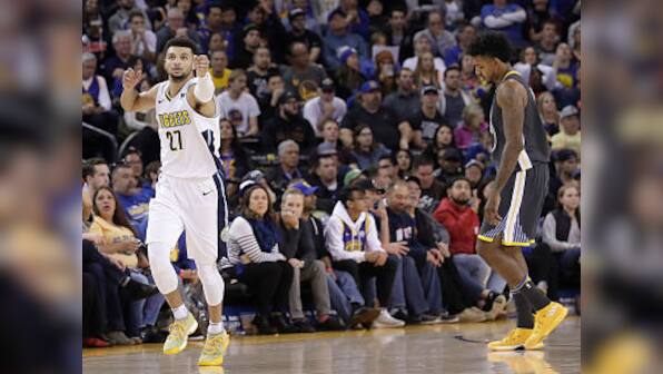 NBA: Nuggets end Warriors' 11-game winning streak with shock victory; Celtics storm past Bulls