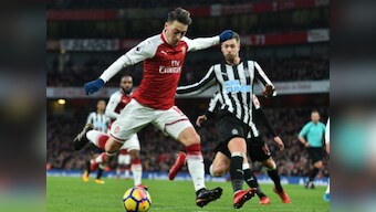 Premier League: Mesut Ozil's stunning strike helps Arsenal beat Newcastle United; Chelsea edge past Southampton