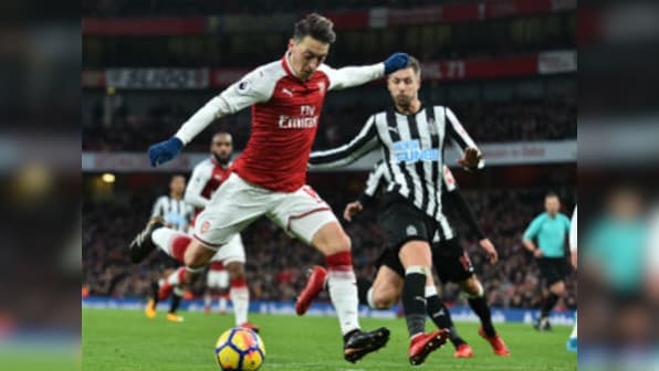 Premier League: Mesut Ozil's stunning strike helps Arsenal beat Newcastle United; Chelsea edge past Southampton