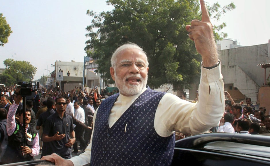 Modi greeted people outside the polling booth. Later, he stood on the foot-board of his car and waived to the crowd. Pallavi Rebbapragada Modi greeted people outside the polling booth. Later, he stood on the foot-board of his car and waived to the crowd. Pallavi Rebbapragada