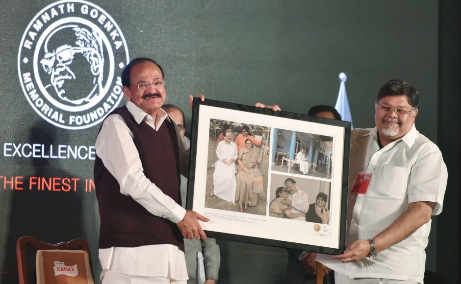 Naidu was presented a collage of his old photographs by Viveck Goenka, Chairman of Indian Express Group. PTI Naidu was presented a collage of his old photographs by Viveck Goenka, Chairman of Indian Express Group. PTI