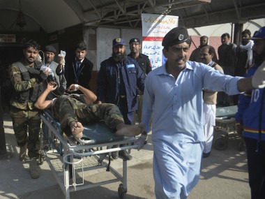 Twelve killed, 32 injured as burqa-clad Taliban militants attack agriculture college in Pakistan's Peshawar Twelve killed, 32 injured as burqa-clad Taliban militants attack agriculture college in Pakistan's Peshawar