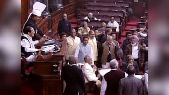 Rajya Sabha adjourned till 2 pm as 2G spectrum scam judgment creates ruckus; Opposition demands clarification from PM