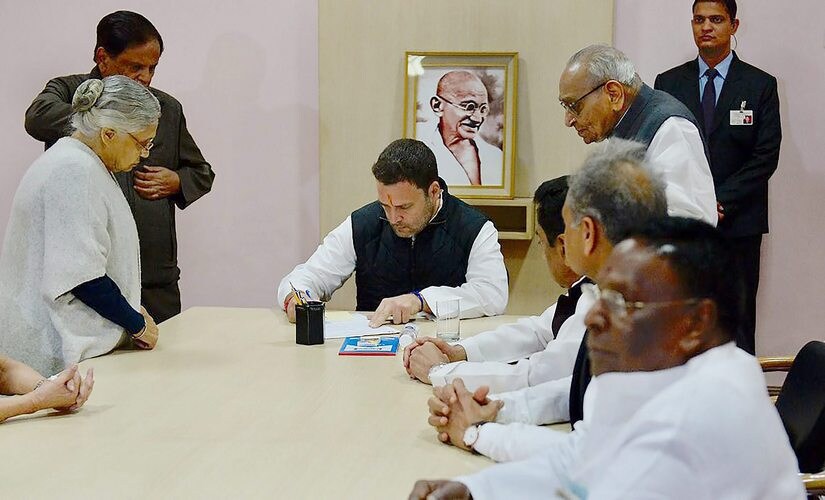 New Delhi: Congress Vice President Rahul Gandhi with party leaders Moti Lal Vohra, Shiela Dixit and others as he files his nomination papers for party president's post at the party headquarters in New Delhi on Monday. PTI