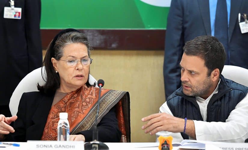 Congress President Rahul Gandhi sits with his mother and former Congress president Sonia Gandhi at the Congress Working Committee (CWC) meeting in New Delhi on Friday. PTI