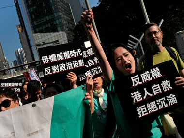 Around 1,000 participate in 'anti-authoritarian' protest in Hong Kong against growing Chinese pressure Around 1,000 participate in 'anti-authoritarian' protest in Hong Kong against growing Chinese pressure