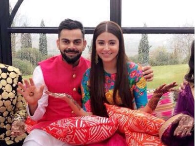 Virat Kohli, Anushka Sharma arrive in Delhi; couple to host grand reception on 21 December Virat Kohli, Anushka Sharma arrive in Delhi; couple to host grand reception on 21 December