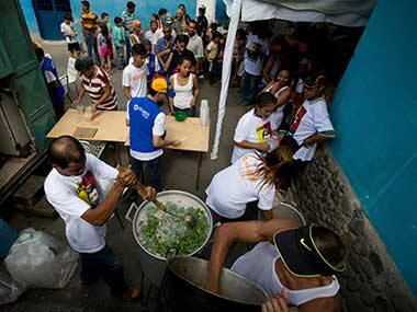 As Nicolas Maduro consolidates power, Venezuela's Opposition reinvents itself with free meals, medical checkups