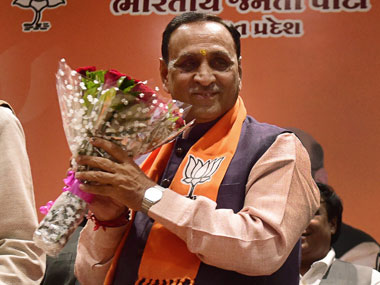 Vijay Rupani takes oath for second consecutive term as Gujarat CM; Narendra Modi, Amit Shah attend ceremony Vijay Rupani takes oath for second consecutive term as Gujarat CM; Narendra Modi, Amit Shah attend ceremony