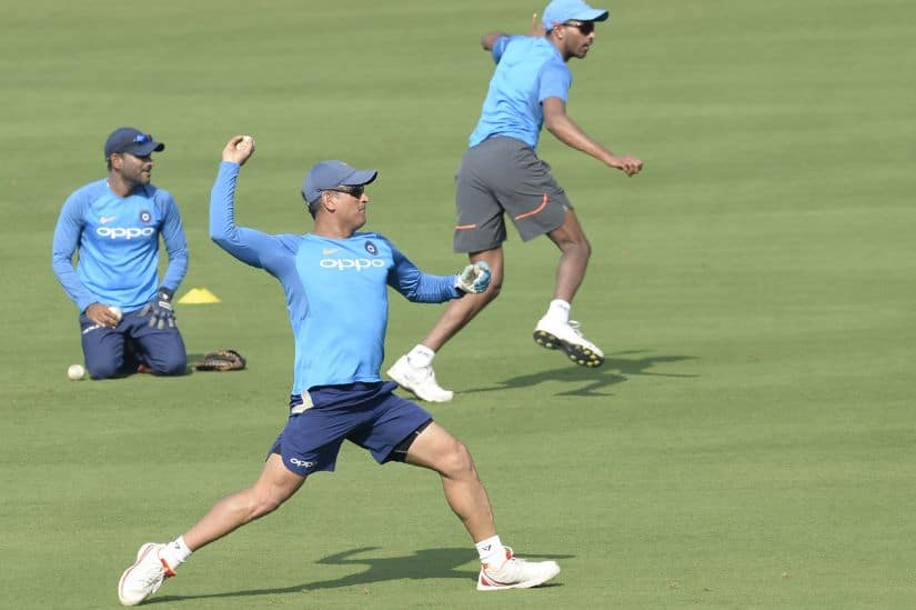 MS Dhoni warms-up ahead of the third ODI in Visakhapatnam. AFP