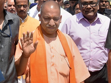 Man tries to jump in front of Yogi Adityanath's car to draw his attention to illegal mining Man tries to jump in front of Yogi Adityanath's car to draw his attention to illegal mining