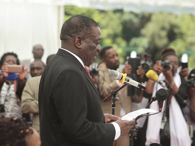 Emmerson Mnangagwa pledges to form a united, non-racial Zimbabwe at party congress Emmerson Mnangagwa pledges to form a united, non-racial Zimbabwe at party congress