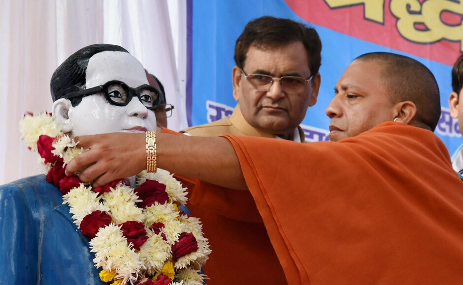 Uttar Pradesh chief minister Yogi Adityanath also paid floral tributes to Ambedkar on his 62nd Mahaparinirvan Diwas in Lucknow on Wednesday. PTI Uttar Pradesh chief minister Yogi Adityanath also paid floral tributes to Ambedkar on his 62nd Mahaparinirvan Diwas in Lucknow on Wednesday. PTI